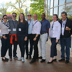 Photo of a group of happy people. Link to Life Stage Gift Planner Ages 45-65 Situations.