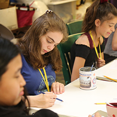 Photo of students in class. Links to Gifts of Life Insurance